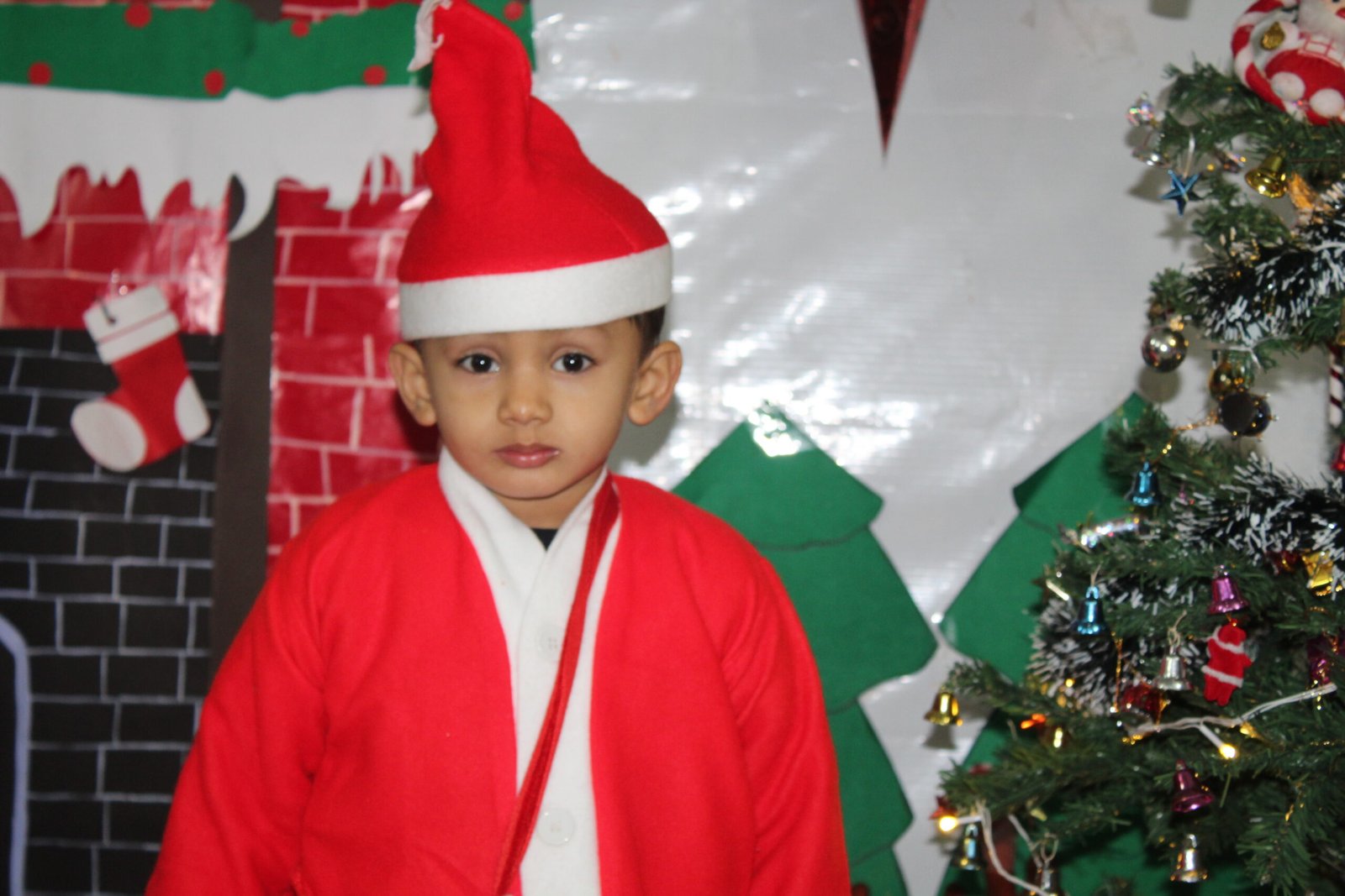 A boy in Christmas Dress